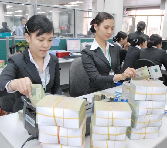 Vietnamese banks have stepped up selling shares to and cooperating with foreign partners, and opening more branches and subsidiaries abroad in preparations for deeper international integration (Illustrative photo: SGGP)